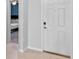Bright entryway with tile flooring and a view of a bedroom at 3519 Lounging Wren Ln, Bartow, FL 33830