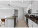 Modern kitchen with stainless steel appliances and granite countertops at 3519 Lounging Wren Ln, Bartow, FL 33830