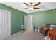 Bedroom featuring a calming green color scheme at 3519 Lounging Wren Ln, Bartow, FL 33830