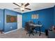 Home office with a desk, chair, and wall decor at 3519 Lounging Wren Ln, Bartow, FL 33830
