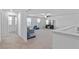 Open bonus room with sectional sofa and hallway access at 3519 Lounging Wren Ln, Bartow, FL 33830