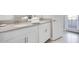 Clean bathroom with double sinks and modern white cabinets at 4625 Target Blvd, Kissimmee, FL 34746