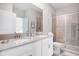 Modern bathroom with double sinks, a large shower, and elegant fixtures at 4625 Target Blvd, Kissimmee, FL 34746