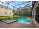 Private pool and spa with a screened enclosure at 4625 Target Blvd, Kissimmee, FL 34746