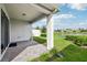 Covered patio with pond and landscape view at 2952 Cherry Blossom Loop, Saint Cloud, FL 34771