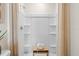 Clean shower with multiple shelves and neutral color scheme at 2224 Tongass Bnd, Davenport, FL 33837