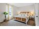 Spacious bedroom with carpeted floor and large window at 2224 Tongass Bnd, Davenport, FL 33837
