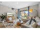 Living room with sectional sofa, sliding door to backyard, and open floor plan at 2224 Tongass Bnd, Davenport, FL 33837