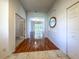Bright and spacious entryway with hardwood floors at 24023 Robinwood St, Leesburg, FL 34748