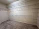 Spacious walk-in closet with wire shelving and ample storage at 24023 Robinwood St, Leesburg, FL 34748