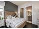 Serene bedroom with en-suite bathroom and ample closet space at 1604 Evening Summit Cir, Minneola, FL 34715