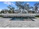 Resort-style pool with water features and spacious patio at 1604 Evening Summit Cir, Minneola, FL 34715