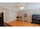 Bedroom with wood floors, closet, and shelving at 938 Framlingham Ct # 102, Lake Mary, FL 32746