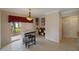 Small dining area with table and chairs near kitchen at 938 Framlingham Ct # 102, Lake Mary, FL 32746