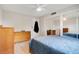 Bright bedroom with mirrored closet doors and wood flooring at 1000 Lake Of The Woods Blvd # A204, Fern Park, FL 32730