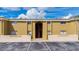Building entrance with stairs and parking lot at 1000 Lake Of The Woods Blvd # A204, Fern Park, FL 32730