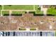 Aerial view of condo building roofs and parking at 1000 Lake Of The Woods Blvd # A204, Fern Park, FL 32730