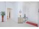 Bright and airy entryway with decorative console table at 3070 Silver Fin Way, Kissimmee, FL 34746