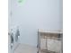 Convenient laundry room with washer, dryer, and storage at 3070 Silver Fin Way, Kissimmee, FL 34746