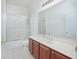 Clean bathroom with single sink vanity and shower/tub combo at 3070 Silver Fin Way, Kissimmee, FL 34746