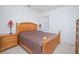 Comfortable bedroom with a queen-size bed and nightstands at 3070 Silver Fin Way, Kissimmee, FL 34746