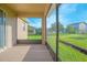 Spacious screened-in porch with view of backyard at 3070 Silver Fin Way, Kissimmee, FL 34746