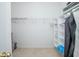 Large walk-in closet with built-in shelving and hanging rods at 3070 Silver Fin Way, Kissimmee, FL 34746
