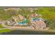 Resort-style community pool and clubhouse with lake access at 3070 Silver Fin Way, Kissimmee, FL 34746