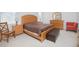 Spacious bedroom with wood furniture and ample closet space at 3070 Silver Fin Way, Kissimmee, FL 34746