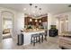 Modern kitchen island with stainless steel appliances at 12777 Bosworth Ave, Windermere, FL 34786