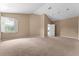 Large bedroom with carpeted floors and neutral wall colors at 2128 Lake Crescent Ct, Windermere, FL 34786