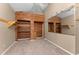 Large walk-in closet with cedar wood shelving and hanging rods at 2128 Lake Crescent Ct, Windermere, FL 34786
