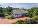 Two-story house exterior with a large yard and driveway at 2128 Lake Crescent Ct, Windermere, FL 34786