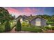 Beautiful home exterior with landscaping at 2128 Lake Crescent Ct, Windermere, FL 34786