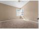 Bright bedroom with window seat and large closet at 2128 Lake Crescent Ct, Windermere, FL 34786