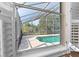View of refreshing pool from interior window at 2128 Lake Crescent Ct, Windermere, FL 34786