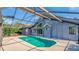 Spacious pool with screen enclosure and home view at 2128 Lake Crescent Ct, Windermere, FL 34786
