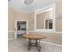 Spacious dining room with a large mirror and ornate chandelier at 2128 Lake Crescent Ct, Windermere, FL 34786