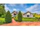 Two-story house with landscaping and a walkway at 2128 Lake Crescent Ct, Windermere, FL 34786