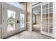 Bright entryway featuring double doors with stained glass inserts at 2128 Lake Crescent Ct, Windermere, FL 34786
