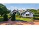 House exterior showcasing a two-story home with landscaping at 2128 Lake Crescent Ct, Windermere, FL 34786