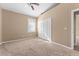 Well-lit bedroom with double-door closet and window at 2128 Lake Crescent Ct, Windermere, FL 34786