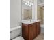 Clean bathroom with updated vanity and shower at 8362 Bella Tierra Ct, Davenport, FL 33896