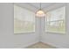 Bright dining area with light flooring and window blinds at 8362 Bella Tierra Ct, Davenport, FL 33896