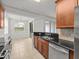 Eat-in kitchen with ample cabinet space and stainless steel appliances at 8362 Bella Tierra Ct, Davenport, FL 33896