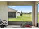 Screened porch overlooking backyard and neighborhood at 205 Bella Verano Way, Davenport, FL 33897