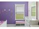 Bedroom with window, dresser, and bench seat at 205 Bella Verano Way, Davenport, FL 33897