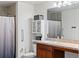 Clean bathroom with shower, toilet, and wood vanity at 205 Bella Verano Way, Davenport, FL 33897