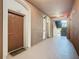 Condo hallway with access to unit 202 at 8298 Portofino Dr # 202, Davenport, FL 33896