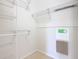 Walk-in closet with wire shelving providing ample storage space at 8298 Portofino Dr # 202, Davenport, FL 33896